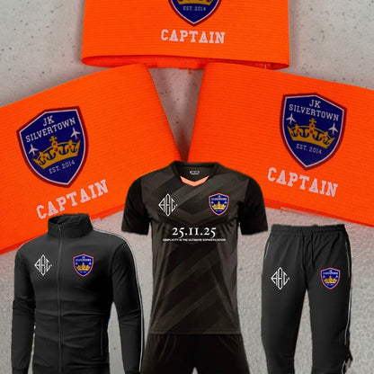 Sports kit with 'JK Silvertown' logo on an orange background